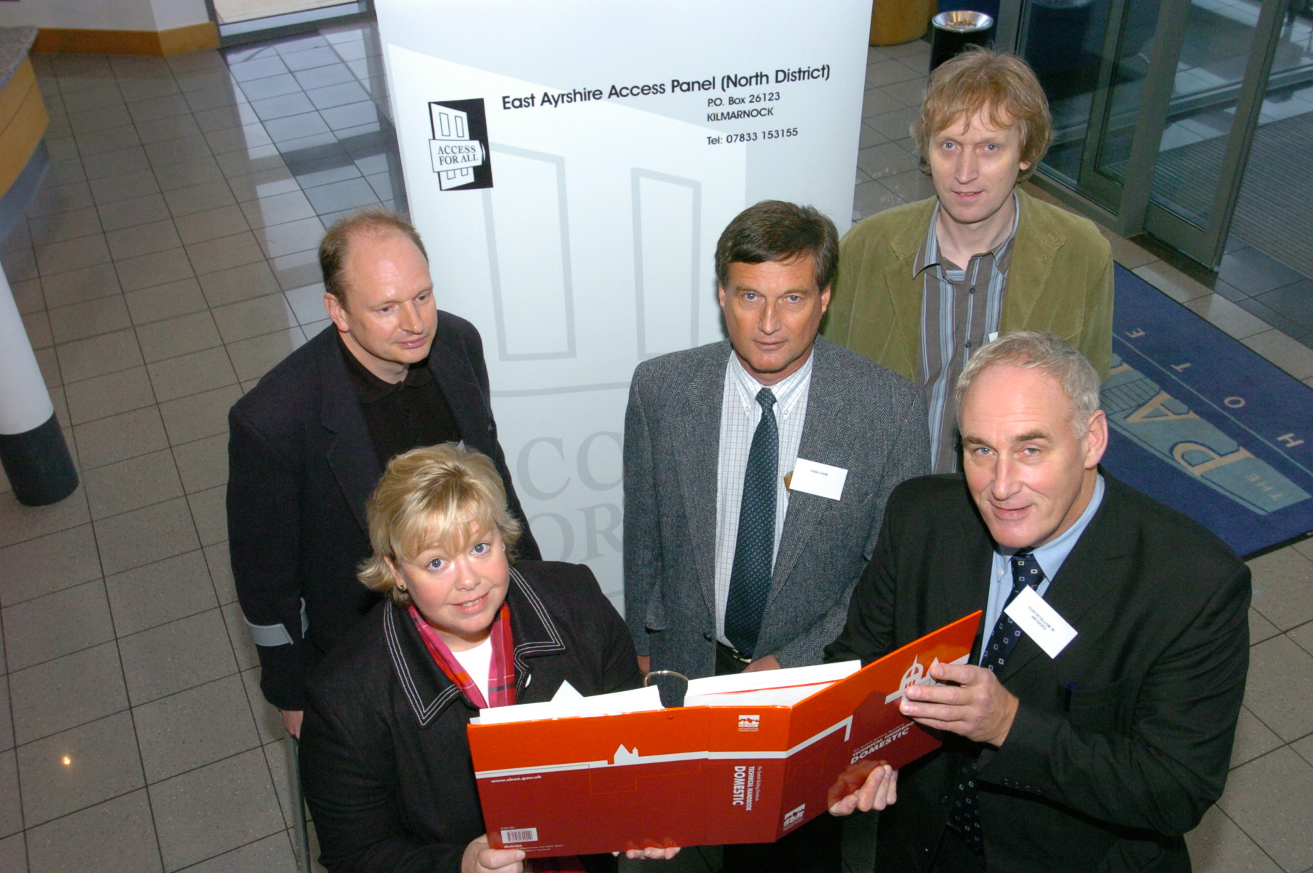 Photograph of Susan Fulton, Councillor Menzies in the foreground and Alan Harley, Tom Book and Robert Pickles in the back row
